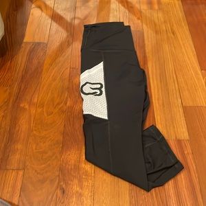 Custom Black CYCLEBAR branded capri with whit mesh side pocket